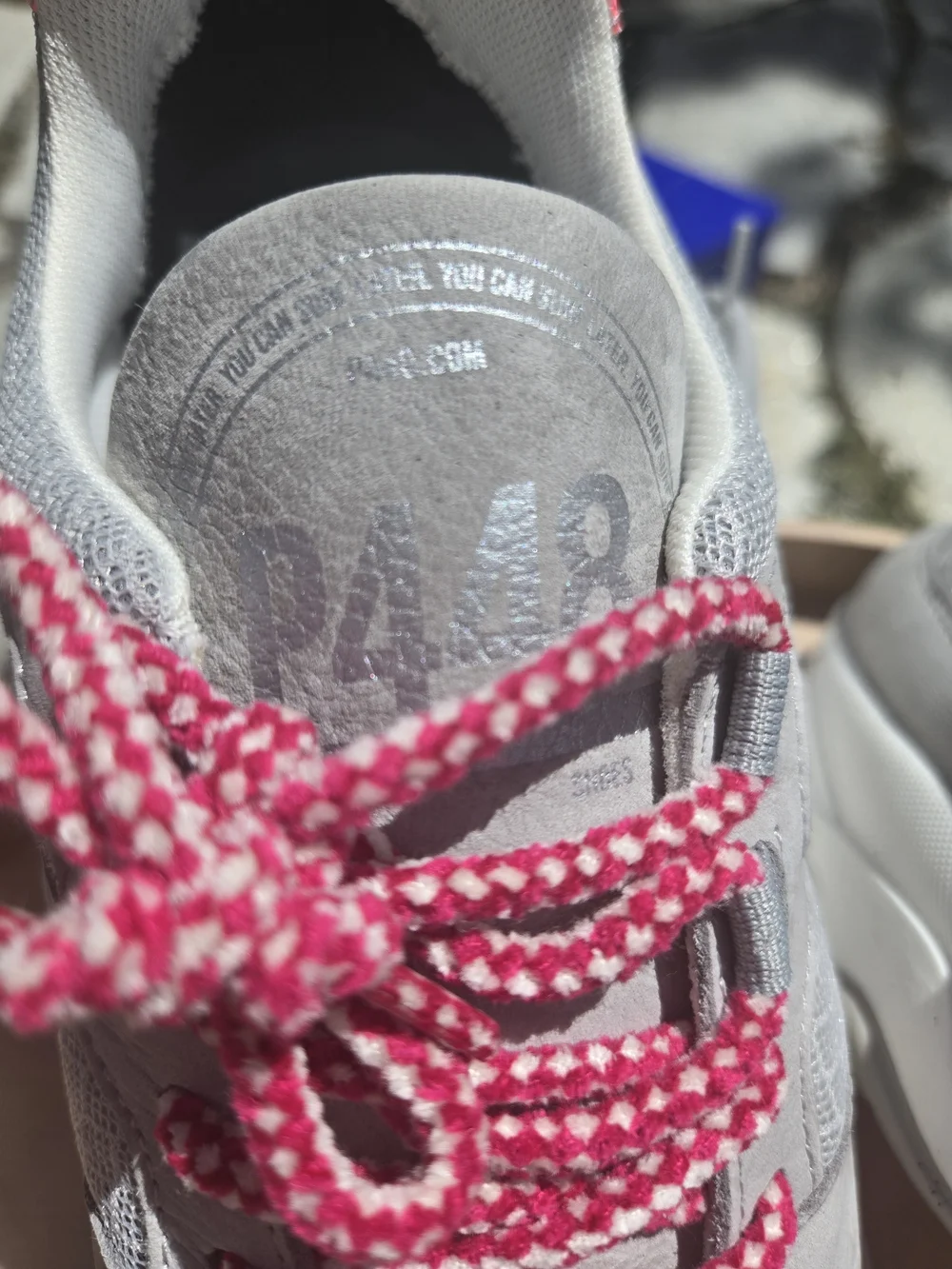 P448 Women's Luke Sneaker — Gray with Pink Accent.